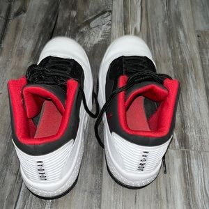 Red and black female Jordan’s, size 7, pre owned but still in great shape